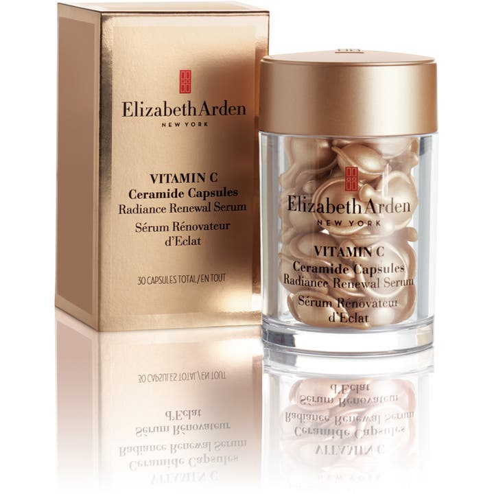 Elizabeth Arden Ceramide Capsules Vitamin C 30 stk serum giver glød i guldæske og gennemsigtig krukke med kapsler