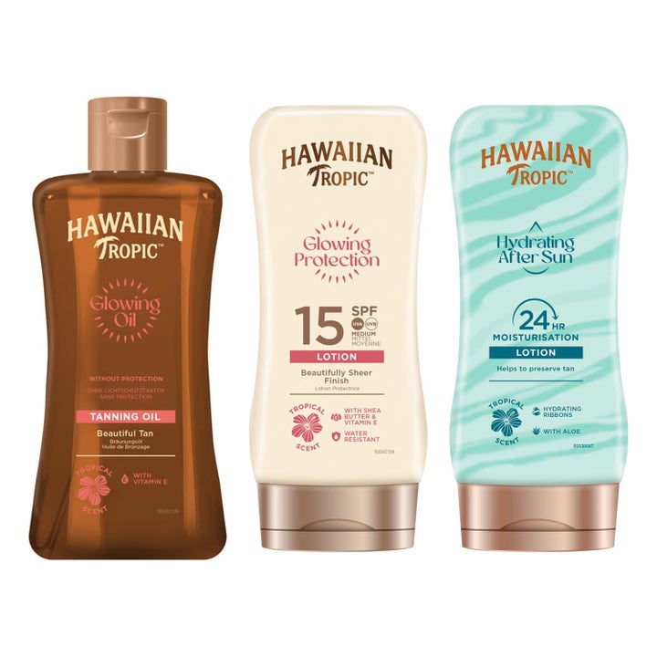 Hawaiian Tropic Glowing Oil og solbeskyttelse sæt giver glød i brun creme og lyseblå flasker med guldhætter