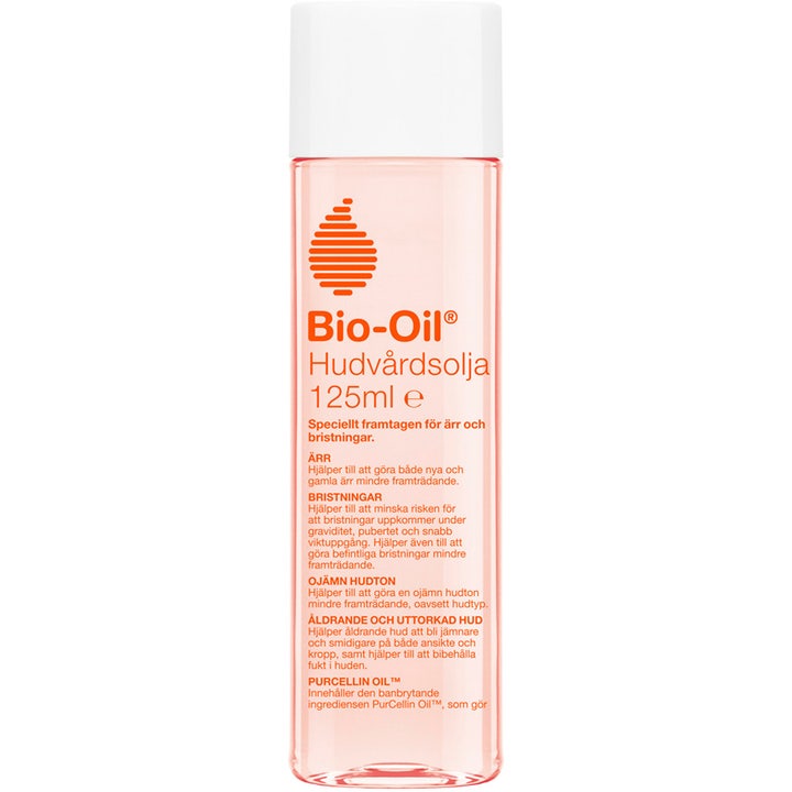 Bio-Oil Hudplejeolie 125 ml mindsker ar og strækmærker i klar plastflaske med hvidt skruelåg og orange tekst.