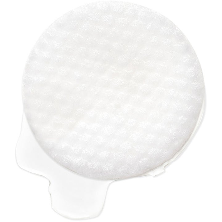 Exuviance Daily Resurfacing Peel 58 ml eksfolierende ansigtspeeling viser en tekstureret rondel med klar væske