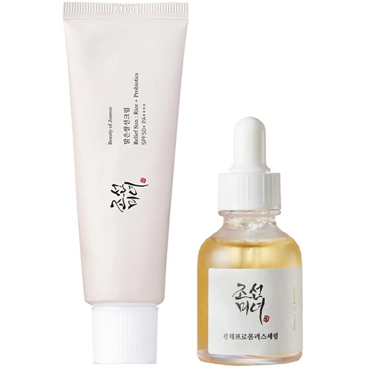 Beauty of Joseon Relief Sun og Glow Serum sæt der giver glød i hvid tube og klar glasflaske med gul væske og pipette.