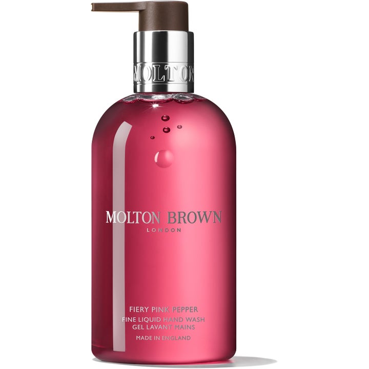 Molton Brown Fiery Pink Pepper Fine Liquid Hand Wash 300ml håndsæbe med pink gele i klar flaske med sølvpumpe.