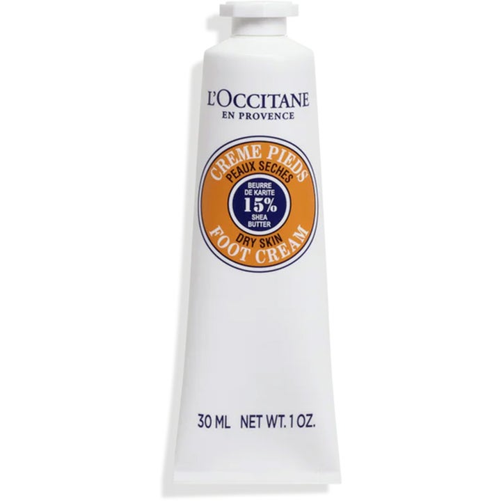 L'Occitane Shea Butter Foot Cream 30 ml blødgørende fodcreme i hvid tube med orange detaljer og hvidt låg.