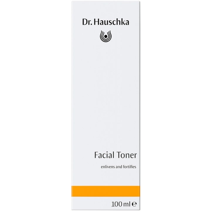 Dr. Hauschka Facial Toner 100 ml opfriskende ansigtsvand i hvid papæske med en bred orange stribe i bunden.