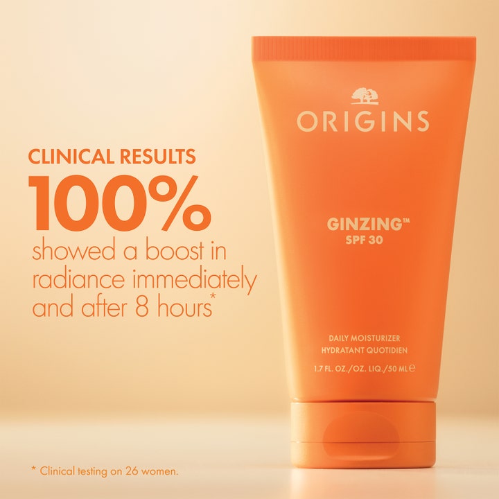 Origins Ginzing SPF30 Daily Moisturizer 50 ml giver glød i orange tube med tekst om kliniske resultater