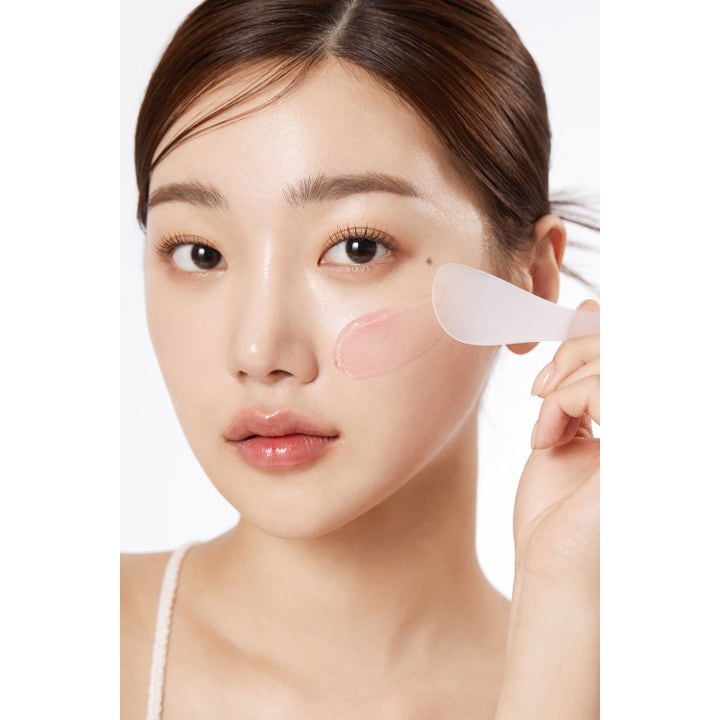 Medicube Collagen Jelly Cream 110 ml fugtgivende ansigtscreme med lyserød geltekstur der påføres med en spatel
