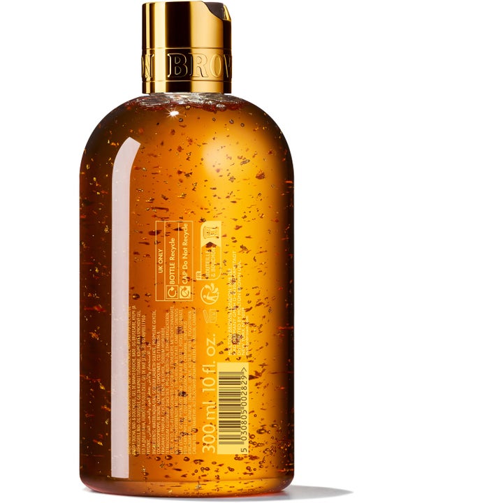 Molton Brown Mesmerising Oudh Accord & Gold 300 ml luksuriøs bodywash med guldflager i gennemsigtig flaske