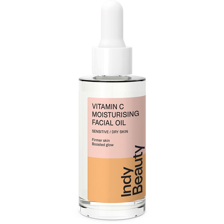 Indy Beauty Vitamin C Moisturising Facial Oil til tør hud i klar glasflaske med hvid pipette for øget glød