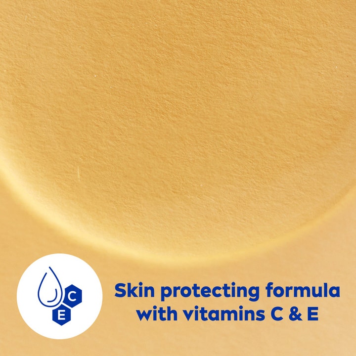 NIVEA Rich Caring Shower Oil 200 ml beskyttende badeolie med vitamin C og E i en gylden tekstur