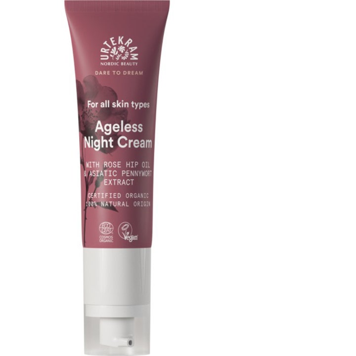 Urtekram Ageless Night Cream regenererende natcreme i en støvet rosa tube med hvid pumpe og blomstermotiv.