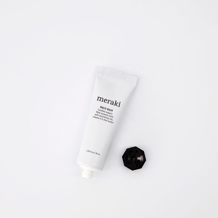 Meraki Multi balm 30 ml fugtgivende balm med sheasmør i hvid tube med et løst sort ottekantet låg.
