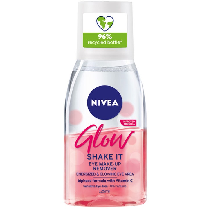 Nivea Glow Shake It 125 ml øjenmakeupfjerner med Vitamin C og to-faset lyserød væske i gennemsigtig plastflaske.