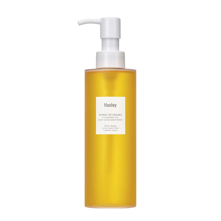 Huxley Secret of Sahara Cleansing Oil 200 ml giver dybderens i klar flaske med gul olie og hvid pumpe