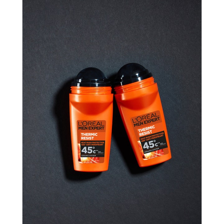L'Oréal Paris Men Expert Thermic Resist 50 ml deodorant mod sved i to orange beholdere på mørk baggrund