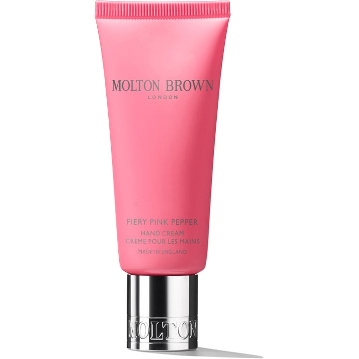 Molton Brown Fiery Pink Pepper Hand Cream fugtgivende håndcreme i en lyserød tube med sølvfarvet låg