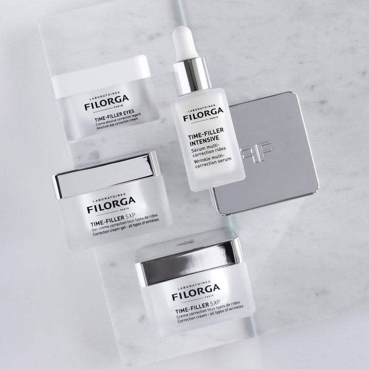Filorga Time-Filler 5 XP Cream Gel 50 ml rynkereducerende ansigtscreme i hvid krukke med sølvlåg på marmor