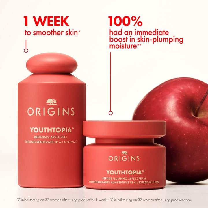 Origins Youthtopia Peptide Plumping Apple Cream 50 ml fugtgivende dagcreme i rød krukke ved siden af et rødt æble