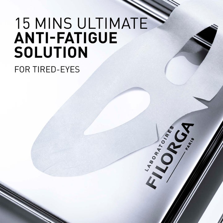 Filorga Optim-Eyes Eye Mask 6 ml opfriskende øjenmaske hvid patch på sølvbaggrund med anti-fatigue solution tekst