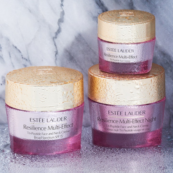 Estée Lauder Resilience Multi-Effect 50 ml opstrammende dagcreme i lyserøde krukker med guldlåg og vanddråber