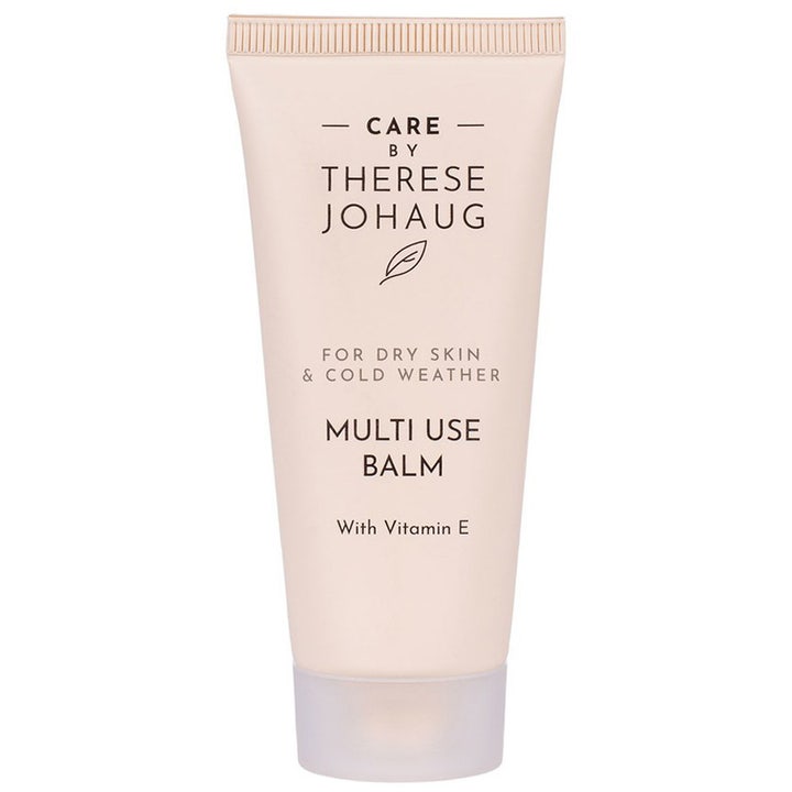 Care by Therese Johaug Multi Use Balm beskyttende balm til tør hud i en lys beige tube med mat gennemsigtig hætte.