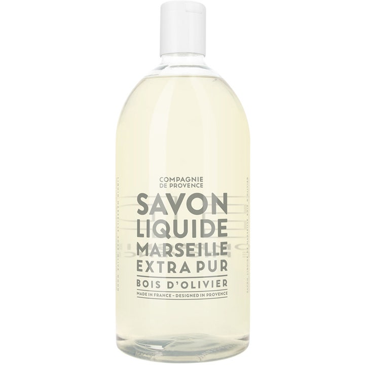 Compagnie de Provence Savon Liquide 1000 ml flydende sæbe i klar plastflaske med hvidt låg der renser huden.