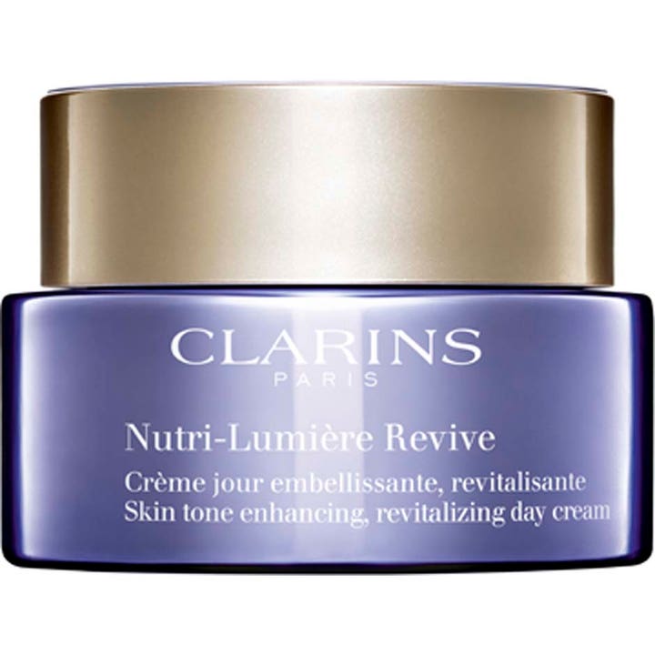 Clarins Nutri-Lumière Revive 50 ml revitaliserende dagcreme i lilla glaskrukke med guldlåg.