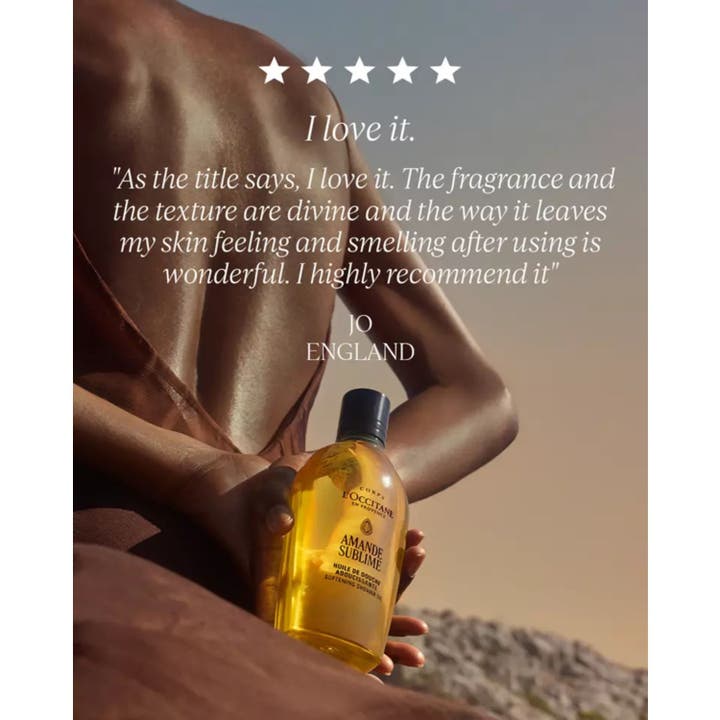 L'Occitane en Provence Almond Shower Oil 250 ml plejende badeolie vist med en positiv kundeanmeldelse og fem stjerner.