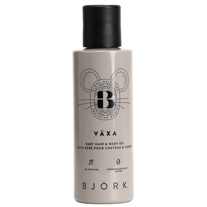 Björk Växa Baby Hair & Body Oil parfumefri babyolie i grå flaske med sort låg og grafisk muselogo.