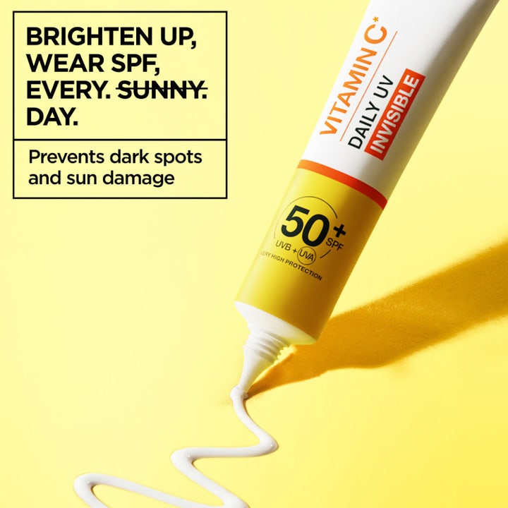 Garnier Vitamin C Glow Boosting Daily UV Fluid 40 ml SPF50+ giver glød vist på tre smilende personer.