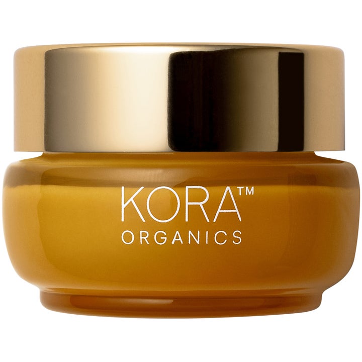 Kora Organics Turmeric Glow Moisturizer 50 ml fugtgivende ansigtscreme i en ravfarvet glaskrukke med guldlåg