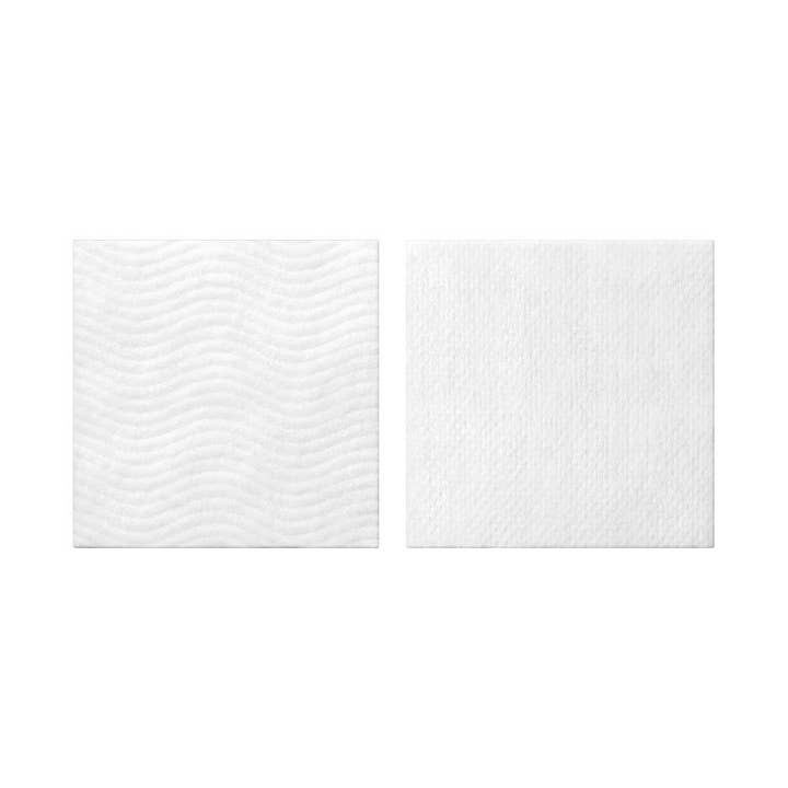 SKIN1004 Madagascar Centella Pure Cotton Pad til ansigtspleje viser to hvide firkantede vatrondeller med bølgemønster