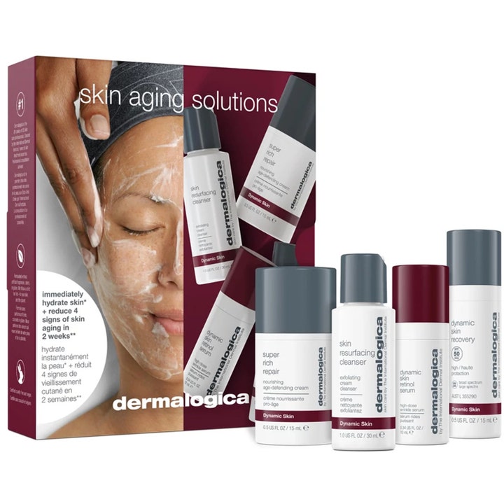 Dermalogica Skin Aging Solutions kit med 4 produkter med retinol mod rynker i hvide flasker foran en bordeauxrød æske.