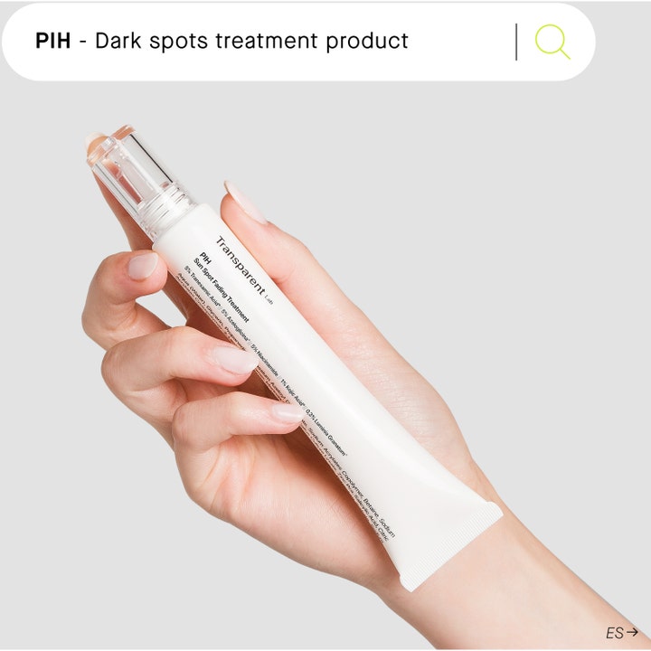 Niche Beauty Lab Transparent Lab P.I.H Sun Spot Fading Treatment 30 ml mod pigmentpletter i hvid tube holdt af en hånd