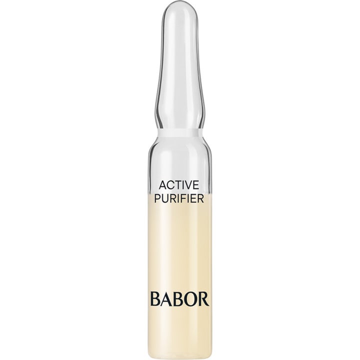 Babor Active Purifier 2 ml ansigtsserum mod urenheder i en klar glasampul med lys gullig væske.