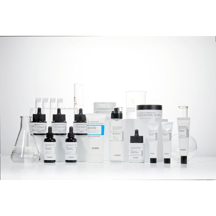 COSRX The Creamide Skin Barrier Moisturizer 80 ml ansigtscreme i hvid tube omgivet af laboratorieudstyr