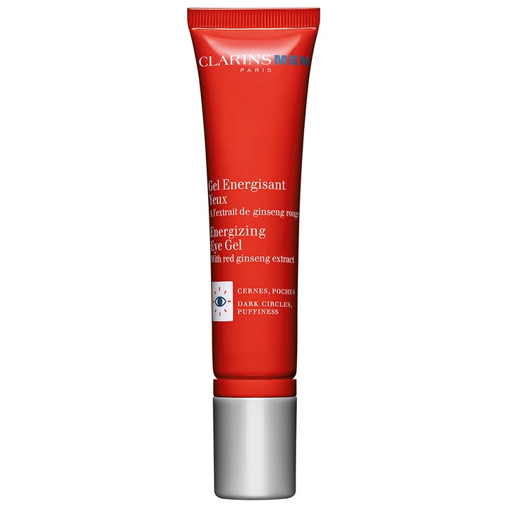 ClarinsMen Energizing Eye Gel opfriskende øjengel mod mørke rande i en rød tube med sølvfarvet låg og rød ginseng.