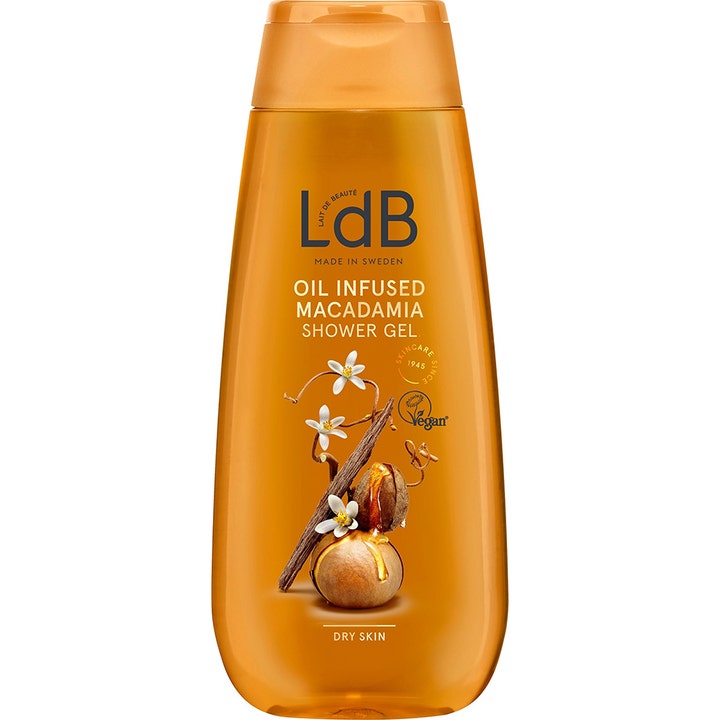 LdB Oil Infused Macadamia Shower Gel fugtgivende kropsvask til tør hud i gylden flaske med macadamianødder og hvide blomster