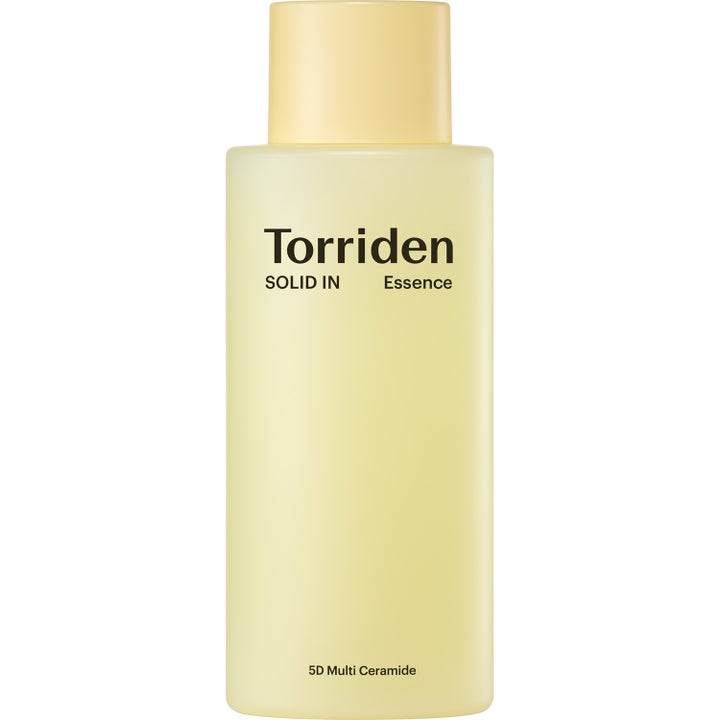 Torriden SOLID IN Essence 100ml styrkende ansigtssessens med 5D ceramider i en minimalistisk lysegul frostet flaske.