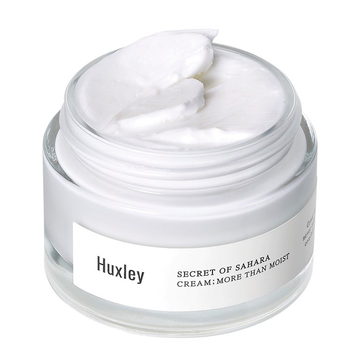 Huxley Secret of Sahara Cream More Than Moist 50 ml fugtgivende ansigtscreme med en tyk hvid tekstur i glaskrukke
