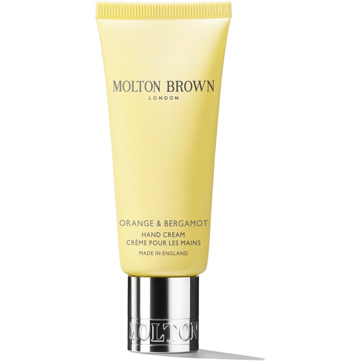 Molton Brown Orange & Bergamot Hand Cream fugtgivende håndcreme i lysegul tube med elegant sølvfarvet låg.