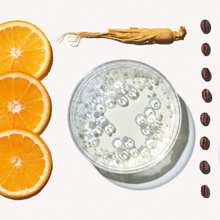 Origins GinZing Brightening Eye Cream 15 ml øjencreme med kaffebønner, ginsengrod og friske appelsinskiver.