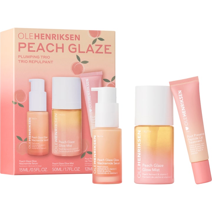 OleHenriksen Peach Glaze Plumping Trio hudplejesæt giver glød med mist og serum i ferskenfarvede gradientflasker
