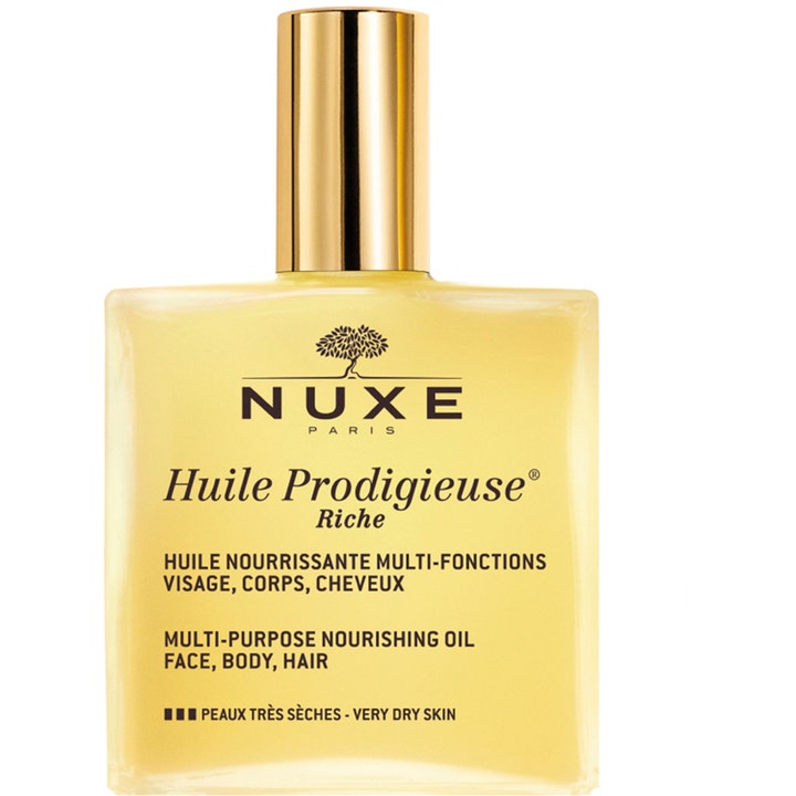 Nuxe Huile Prodigieuse Riche nærende tørolie til meget tør hud i en firkantet glasflaske med skinnende guldlåg