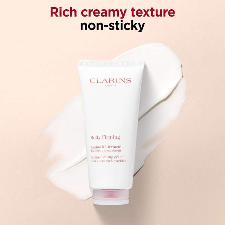 Clarins Body Firming Extra-Firming Cream 200 ml opstrammende kropscreme i hvid tube på en rig cremet tekstur