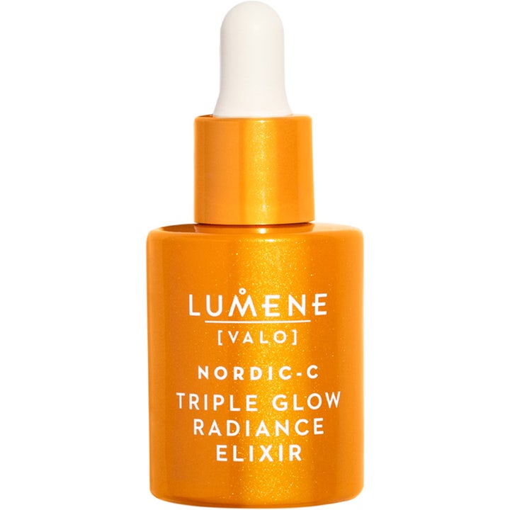 Lumene Nordic-C Triple Glow Radiance Elixir 30 ml glødgivende serum i en glitrende orange flaske med hvid pipette