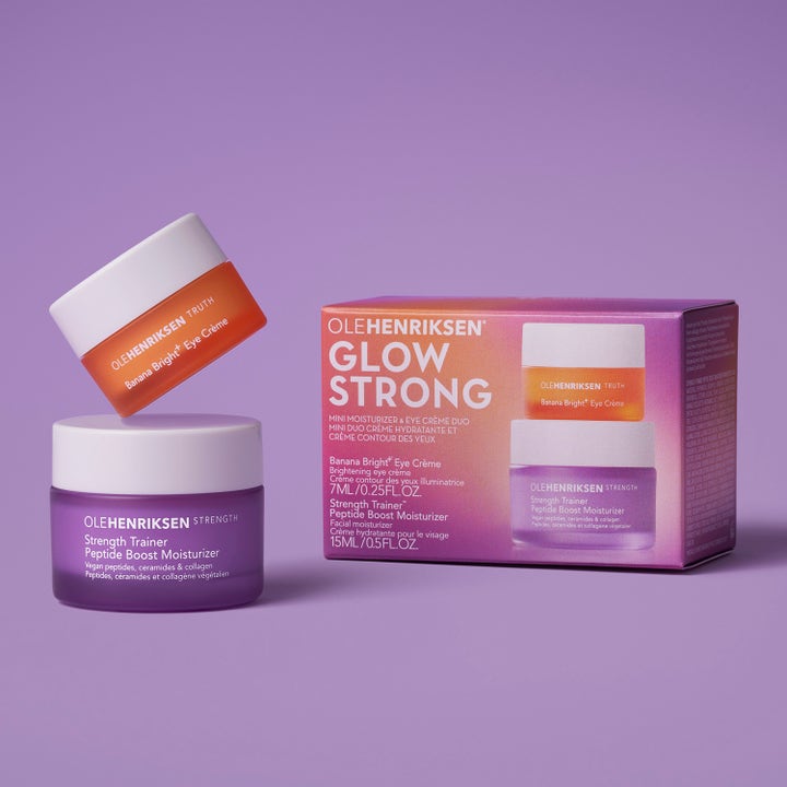 Ole Henriksen Glow Strong hudplejesæt 22 ml ansigtspleje med fugtgivende orange og lilla krukker foran æske