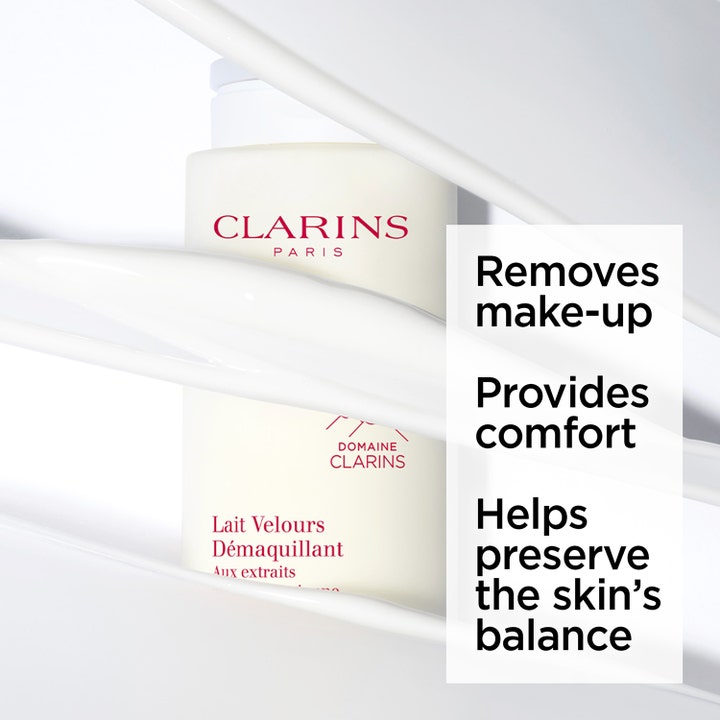 Clarins Velvet Cleansing Milk 200 ml fjerner makeup og giver komfort vist med cremede hvide teksturstrøg.
