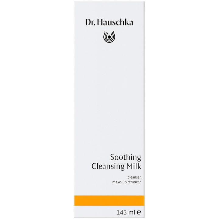 Dr. Hauschka Soothing Cleansing Milk 145 ml beroligende ansigtsrens i hvid papæske med en orange stribe.