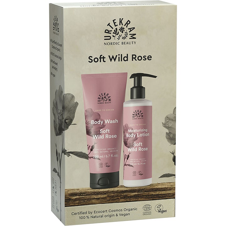 Urtekram Soft Wild Rose 200 ml og 245 ml fugtgivende kropsplejesæt i gaveæske med lyserød tube og hvid pumpeflaske.