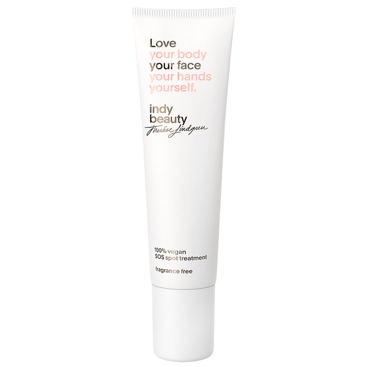Indy Beauty SOS Spot Treatment punktbehandling mod urenheder i en stilren hvid tube med sort og lyserød tekst